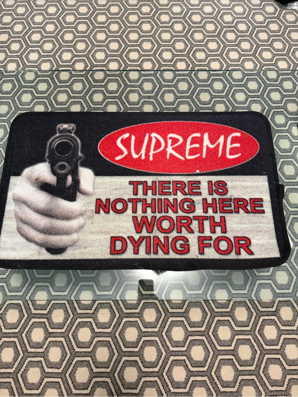 Supreme Red, Black and White Graphic Mat with Handgun Motif